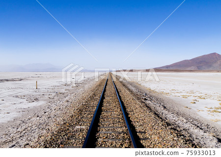 Train tracks on Bolivian salar 75933013