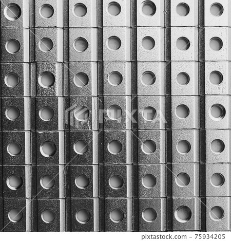 slide screw nuts in a row, abstract industrial background slide screw nuts in a row, abstract industrial background 75934205