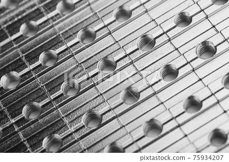 slide screw nuts in a row, abstract industrial background slide screw nuts in a row, abstract industrial background 75934207