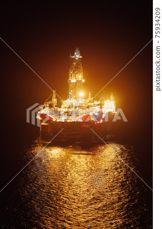 offshore oil platform at night offshore oil platform at night 75934209