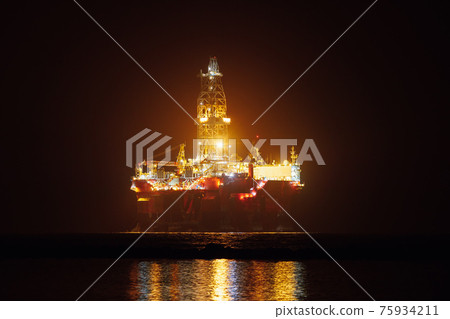 offshore oil platform at night offshore oil platform at night 75934211