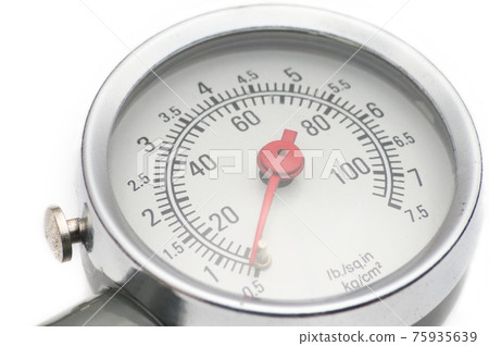Pressure gauge for measuring air pressure in car tires on a white background Pressure gauge for measuring air pressure in car tires on a white background 75935639