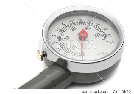 Pressure gauge for measuring air pressure in car tires on a white background Pressure gauge for measuring air pressure in car tires on a white background 75935640