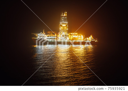 offshore oil drillship at night offshore oil drillship at night 75935921