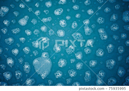 foam spots on blue water 75935995