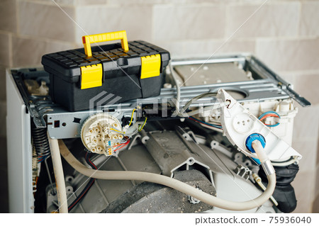 washing machine with open enclosure is ready for service 75936040