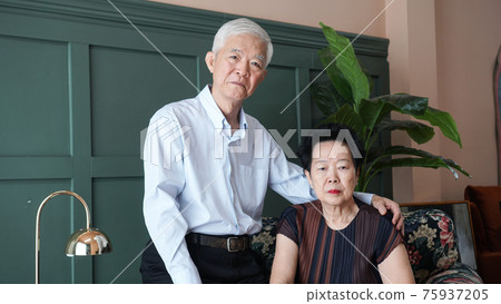 Smart business Asian senior couple happy together in luxury interior house Smart business Asian senior couple happy together in luxury interior house 75937205