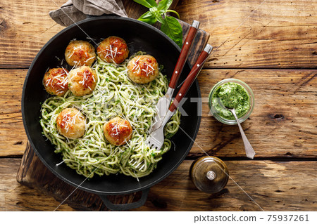 Pasta with meatballs and pesto sauce Pasta with meatballs and pesto sauce 75937261