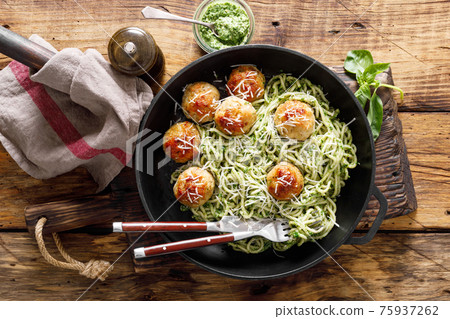 Pasta with meatballs and pesto sauce Pasta with meatballs and pesto sauce 75937262