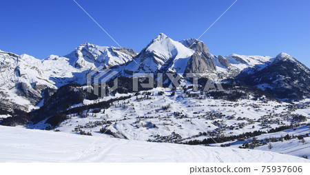 Toggenburg Valley and Alpstein Range in winter. 75937606