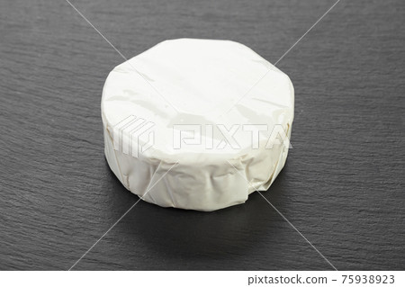 Cheese  Camembert on a black board for serving food. 75938923