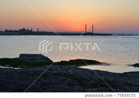 Caspian Sea shore at sunset 75939155