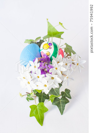Easter eggs and spring flowers Easter eggs and spring flowers 75941992