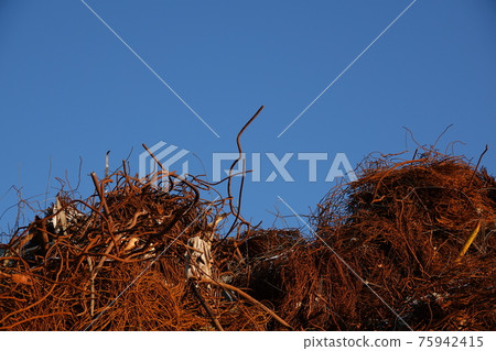 Mountain of iron scrap Mountain of iron scrap 75942415