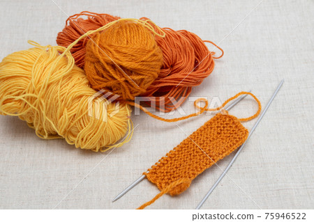 Needlework. Threads of wool yarn, set of knitting needles Needlework. Threads of wool yarn, set of knitting needles 75946522
