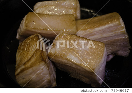 Roasted pork made from large chunks of meat 75946617
