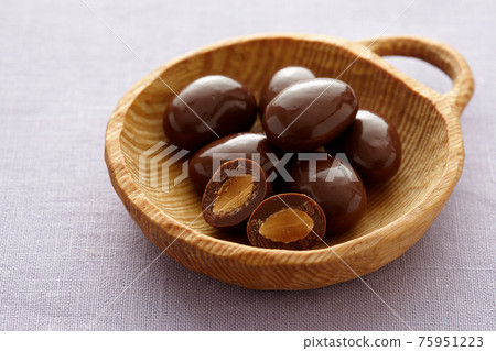 Almond chocolate cross section Almond chocolate cross section 75951223