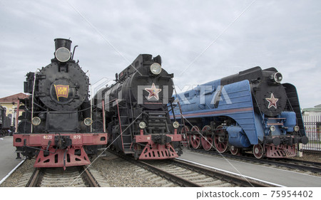 Steam locomotives at railway station Steam locomotives at railway station 75954402