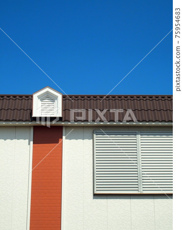 Windows with white walls and blinds, roof and blue sky 75954683