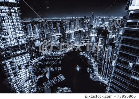 Night view on Dubai Marina skyline, Modern skyscrapers, boats and yachts Night view on Dubai Marina skyline, Modern skyscrapers, boats and yachts 75956900