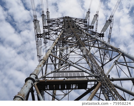 Steel tower and cirrocumulus seen from the mountain trail 75958224