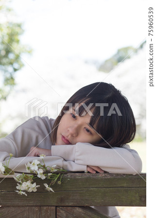 A woman dozing in the park's Azumaya A woman dozing in the park's Azumaya 75960539