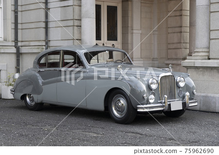 Foreign car that stops in front of the mansion Foreign car that stops in front of the mansion 75962690