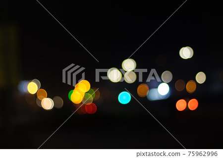 Abstract image of bokeh lights in the city. White, red, orange, blue 75962996