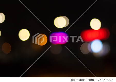 Red and Pink bokeh of lights in the city Red and Pink bokeh of lights in the city 75962998