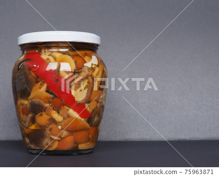 mixed champignons and porcini mushrooms in jar mixed champignons and porcini mushrooms in jar 75963871