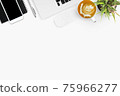 White office desk table with laptop, smartphone, cup of coffee and supplies. Top view with copy space, flat lay. 75966277