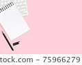Pink pastel office desk with blank notebook, pen and computer keyboard. Top view with copy space, flat lay. 75966279