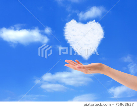 A cloud of hearts floating in the blue sky 75968637