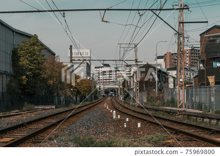 Nankai Shiomibashi Line Kizugawa Station railroad crossing [Osaka City] 75969800