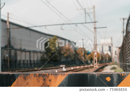 Railroad crossing around Kizugawa Station on the Nankai Shiomibashi Line [Osaka City] 75969850