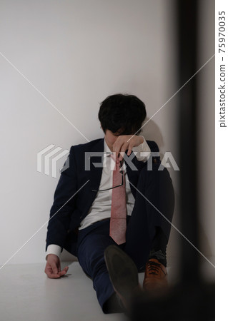 Businessman poor physical condition depression Businessman poor physical condition depression 75970035
