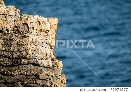 Muckross Head, Donegal - Ireland, popular for horizontally layered sandstone and thin layers of 75971277