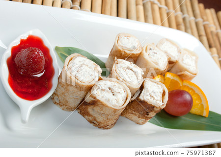 pancakes stuffed with cottage chees 75971387