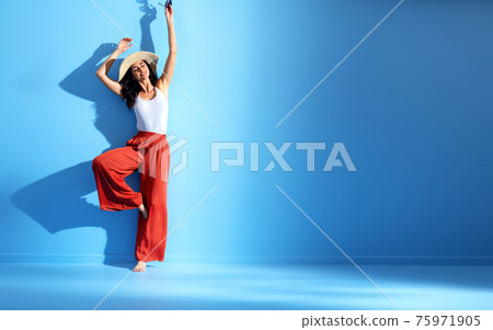 Portrait of a cheerful lady enjoying a summer weather 75971905