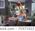 Portrait of a fit, stretching woman 75971922