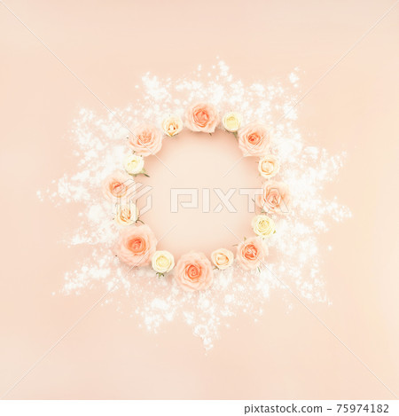 Beautiful pink tea roses wreath on pastel background in retro style. Romantic holiday concept. Flat lay style. Copy space. Beautiful pink tea roses wreath on pastel background in retro style. Romantic holiday concept. Flat lay style. Copy space. 75974182