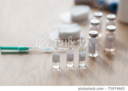 Medical, pharmaceutical industry, covid-19, coronavirus vaccine vial bottles in hospital 75974665