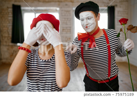 Mime artists, surprise with rose scene Mime artists, surprise with rose scene 75975189