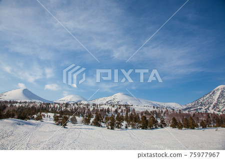 Beautiful snow scene of Hakkoda mountain range in sunny May Beautiful snow scene of Hakkoda mountain range in sunny May 75977967