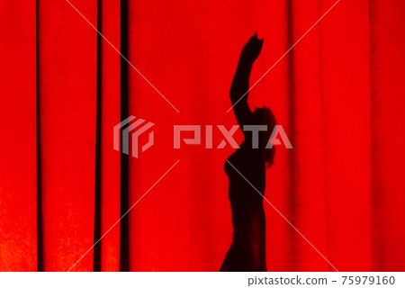 Shadow dancing on the curtain. Reflection dance on colored fabric. Shadow dancing on the curtain. Reflection dance on colored fabric. 75979160