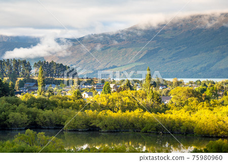 Aerial view of Glenorchy Lagoon Track with town center in the morning in New Zealand. Aerial view of Glenorchy Lagoon Track with town center in the morning in New Zealand. 75980960