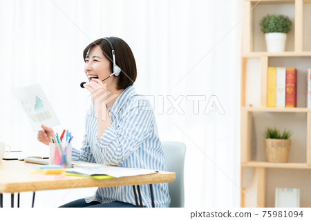 Female telework teleworking personal computer online meeting 75981094