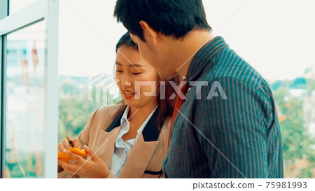 Business people work on project planning board 75981993