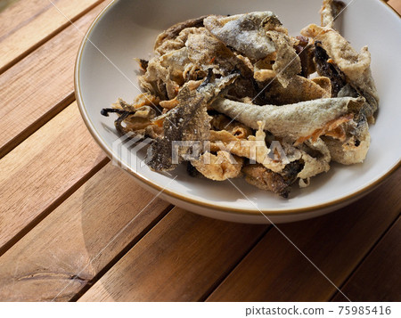Asian food fried fish skin 75985416