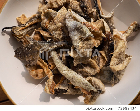 Asian food fried fish skin Asian food fried fish skin 75985434